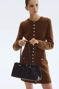 Robe en tricot boutonnée devant