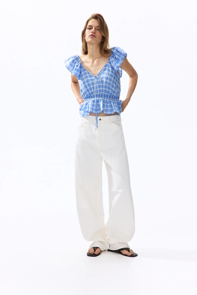 Flutter-Sleeved Peplum Blouse