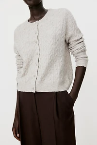 Gilet en tricot torsadé