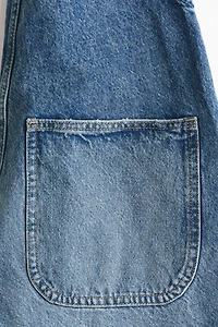 Salopette en denim de coton