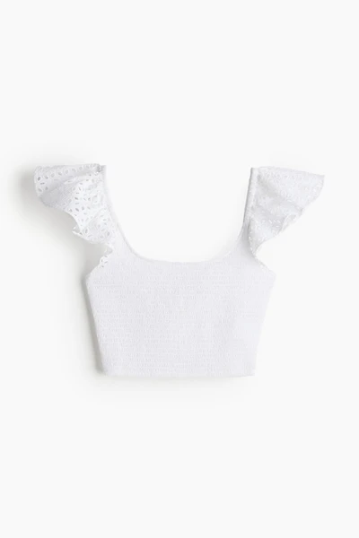 Haut court avec smocks