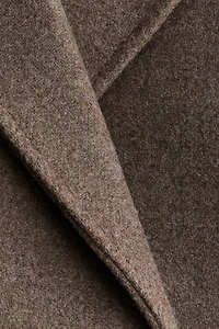 Manteau avec ceinture à nouer