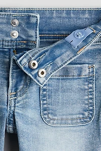 Jeans à jambe évasée
