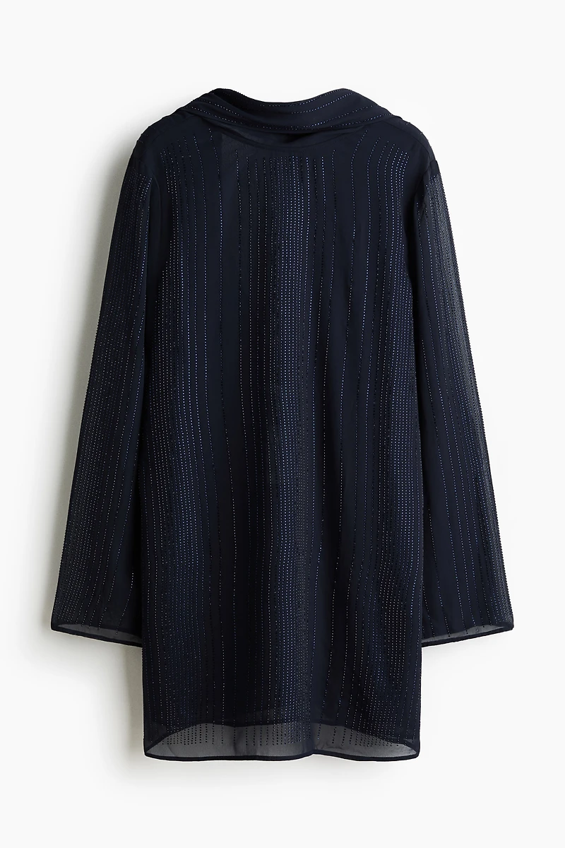 Robe ornée à dos bénitier