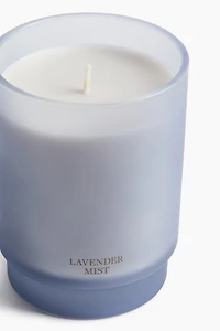 Bougie parfumée dans un pot en verre dépoli