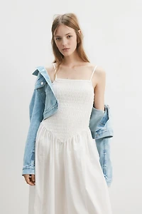 Robe smockée avec jupe évasée