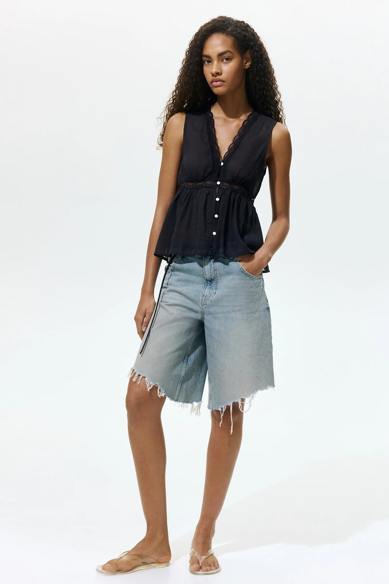 Lace-Trimmed Peplum Top
