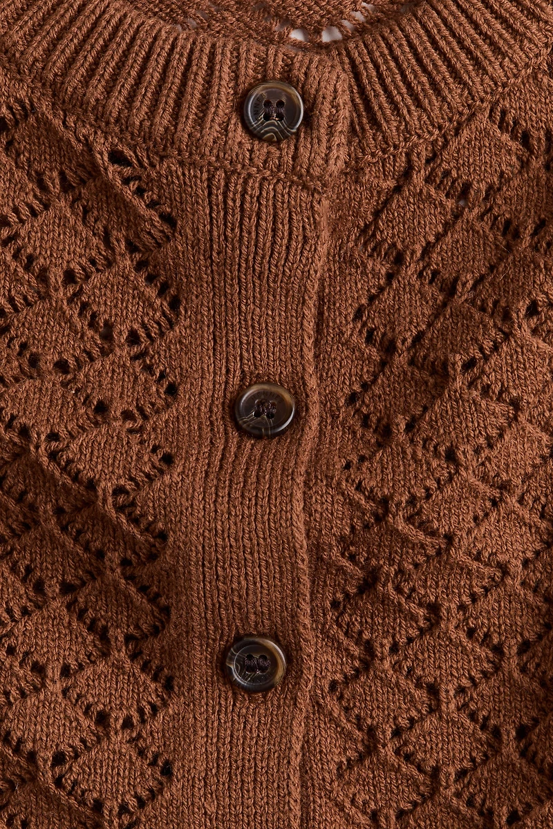 Gilet à mancherons en tricot pointelle