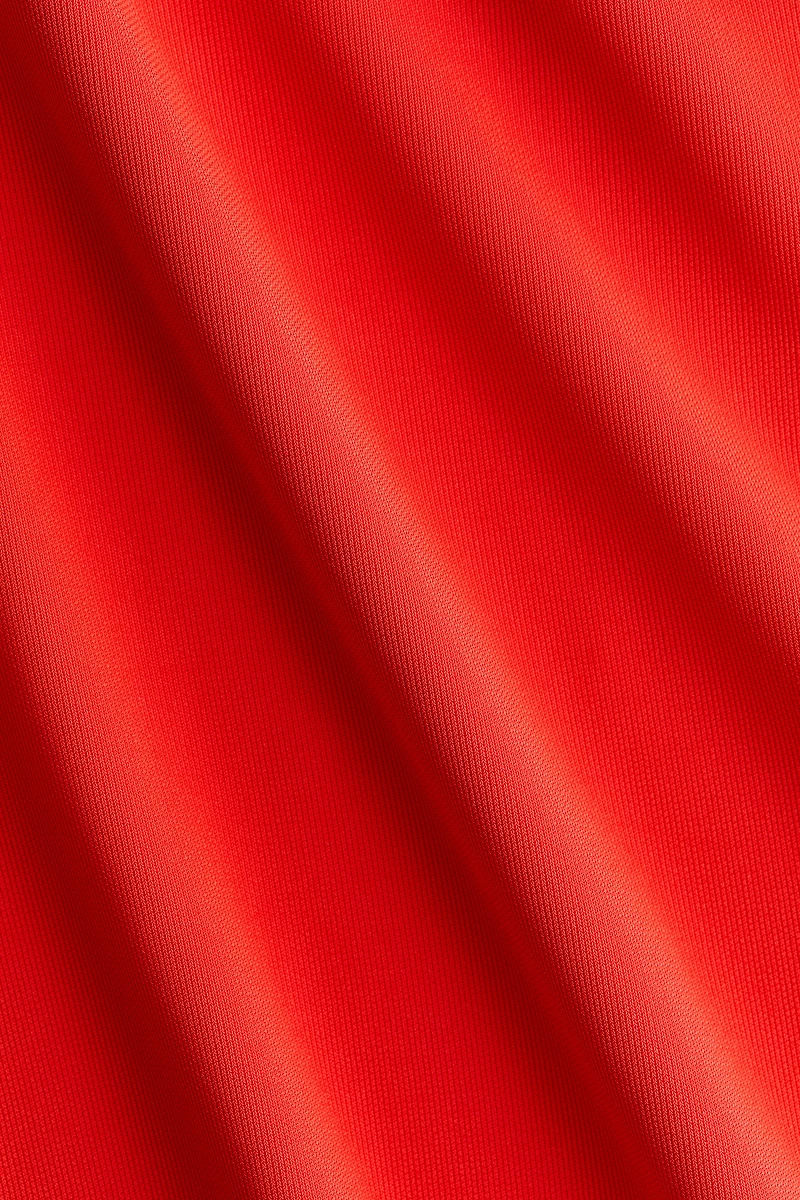 Interlock Peplum Top