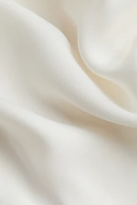 Haut en satin à effet drapé