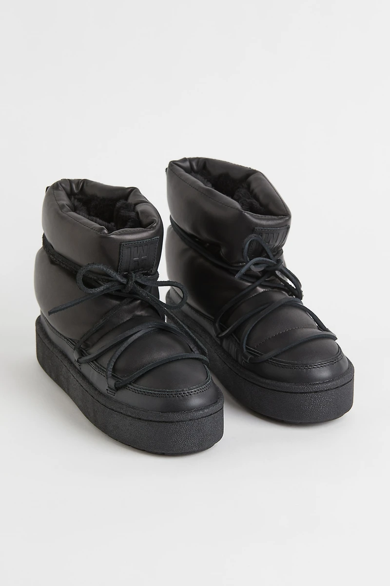 Bottines matelassées à lacets