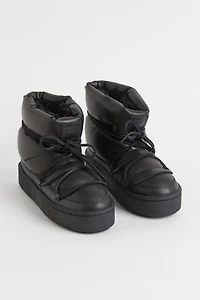 Bottines matelassées à lacets