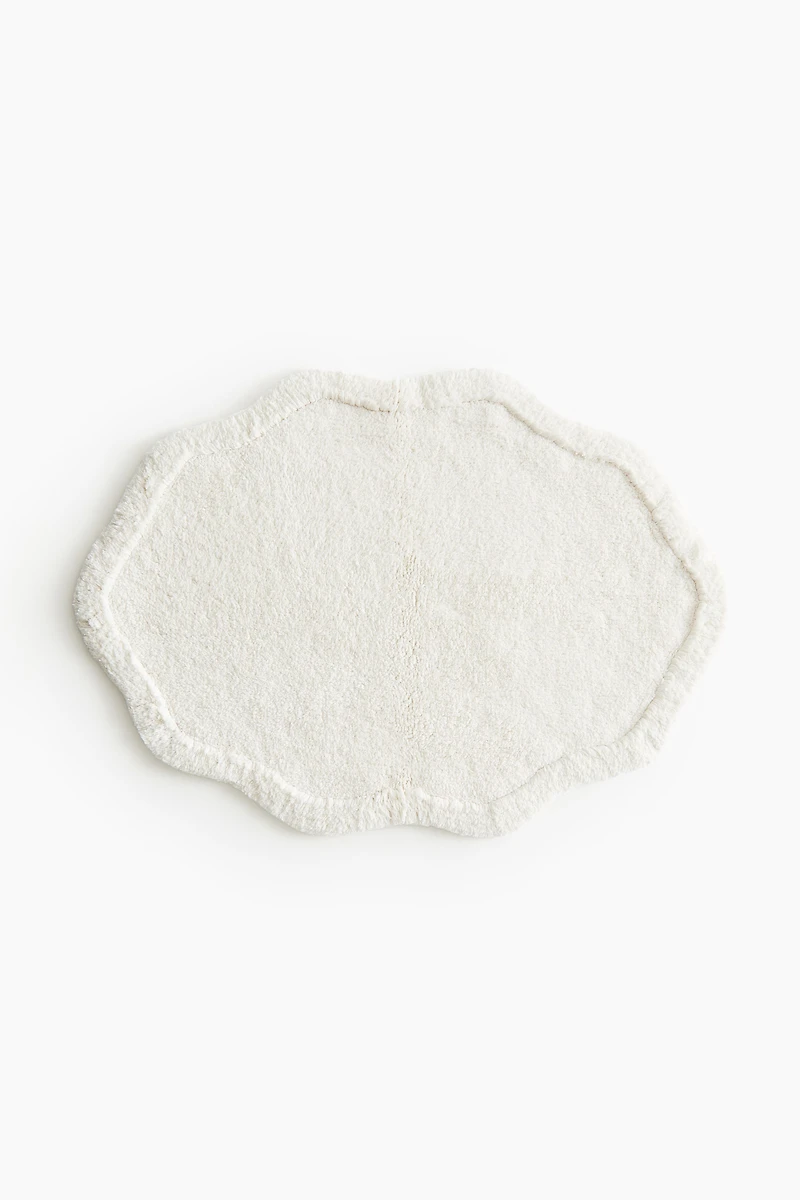 Tapis de bain en coton touffeté