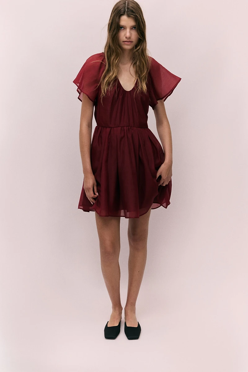 Robe à manches papillon