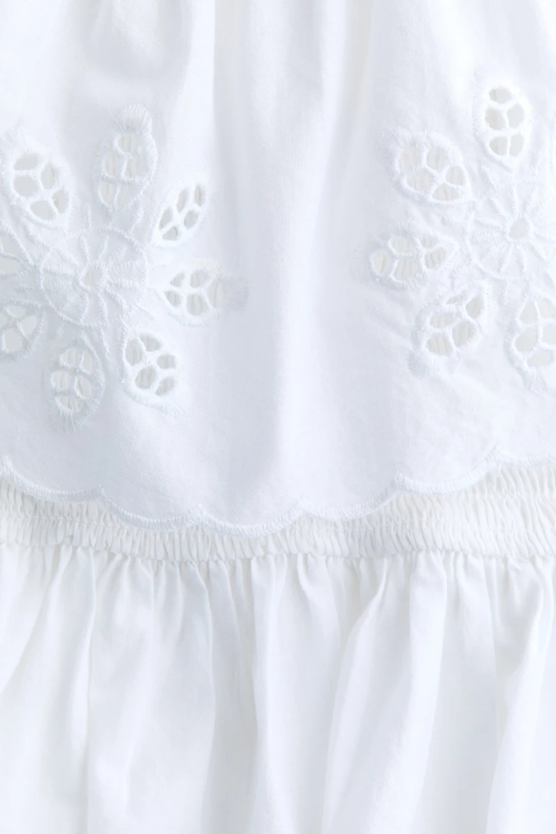 Flounce-Trimmed Peplum Tube Top