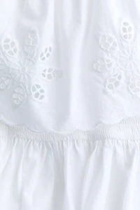Flounce-Trimmed Peplum Tube Top