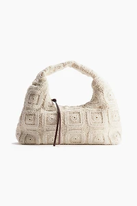 Sac à main à l’aspect crochet