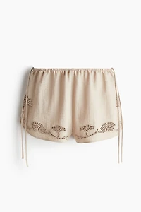 Short de plage fini broderie anglaise