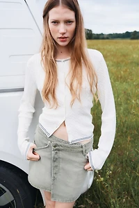 Gilet en tricot torsadé