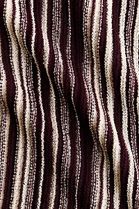 MAMA Robe en tricot avec franges