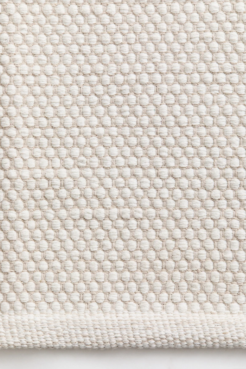 Tapis en coton texturé
