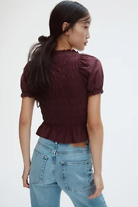 Blouse en nid d'abeille