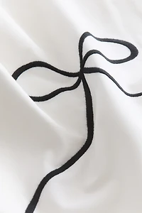 Taie d'oreiller brodée en percale de coton