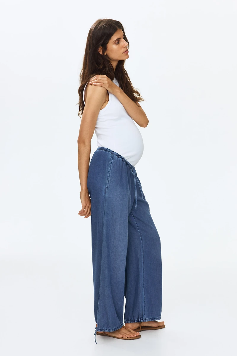 MAMA Pantalon en denim avec jambes ballon