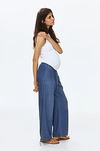 MAMA Pantalon en denim avec jambes ballon