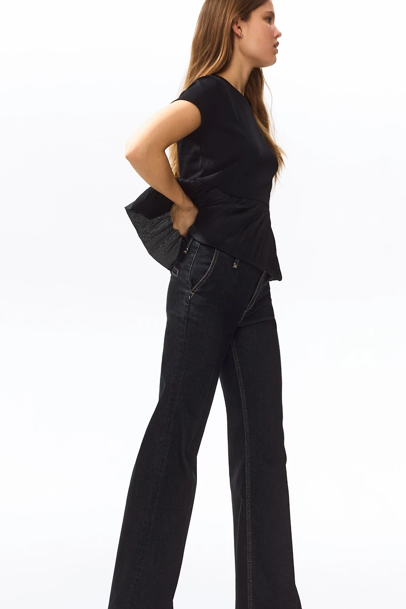 Jean jambe semi-évasée taille haute