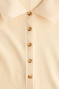 Haut à boutons en tricot fin