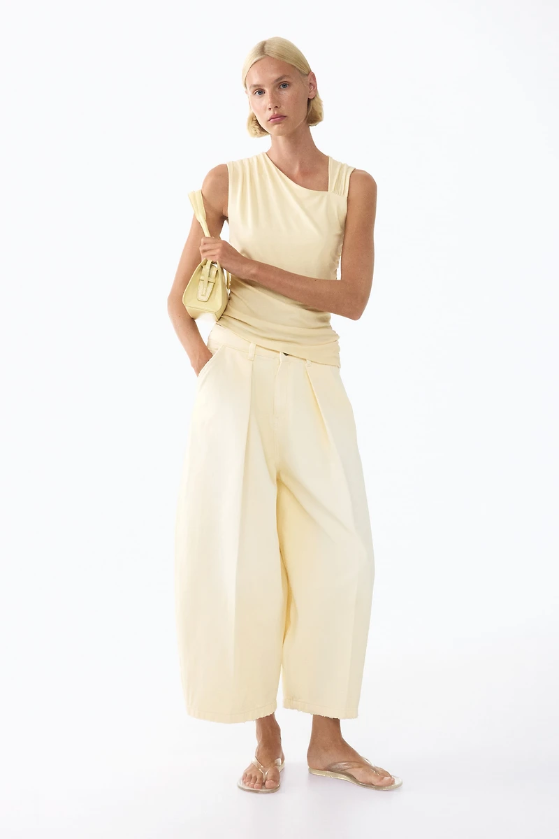 Draped Asymmetric Top