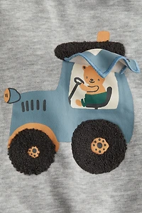 Sweat à l'intérieur brossé avec motif