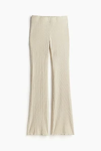 Legging texturé avec jambes évasées