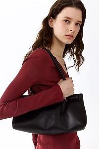 Haut en tricot côtelé avec détail torsadé