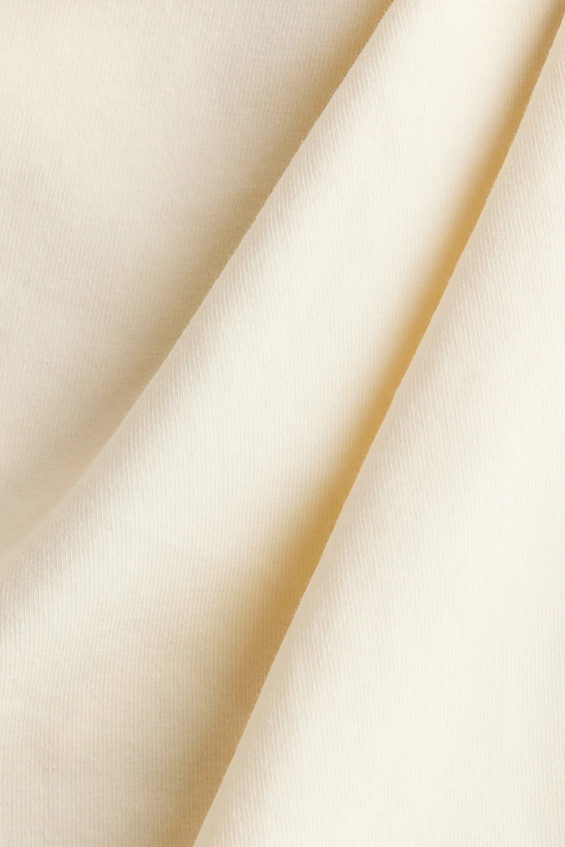 Draped Asymmetric Top