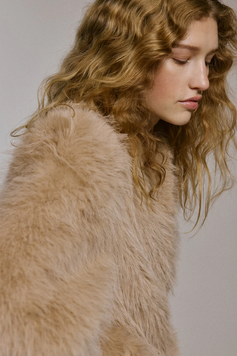 Veste à manches bouffantes