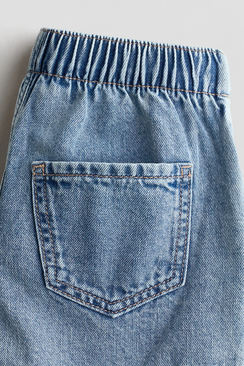 Jupe-short croisée en denim