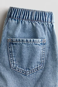 Jupe-short croisée en denim