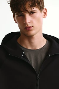 Veste sport fermeture éclair et capuche DryMove🅪