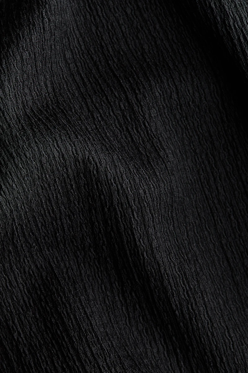 MAMA Short-sleeved tie-belt jumpsuit