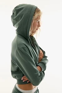 Veste courte avec capuchon et fermeture éclair