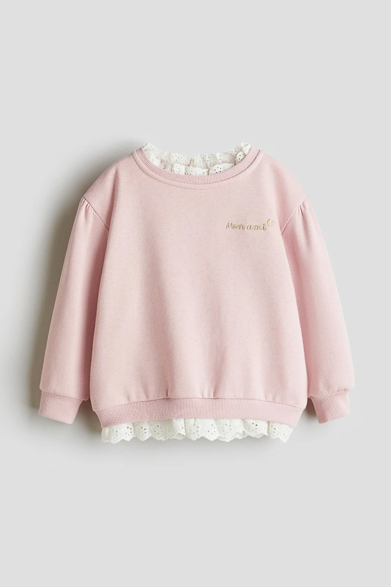 Chandail en molleton volanté