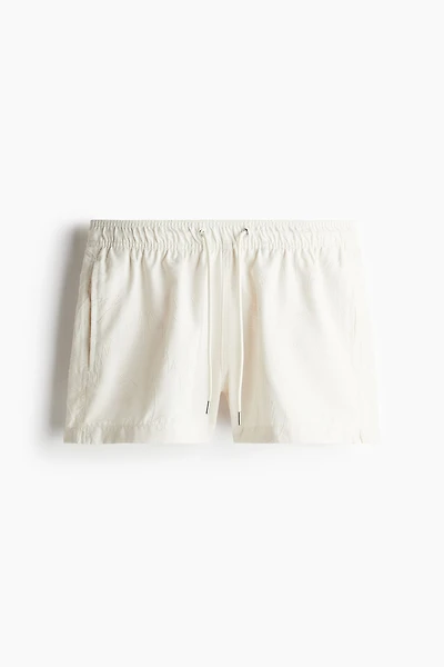 Embroidered-Pattern Swim Shorts