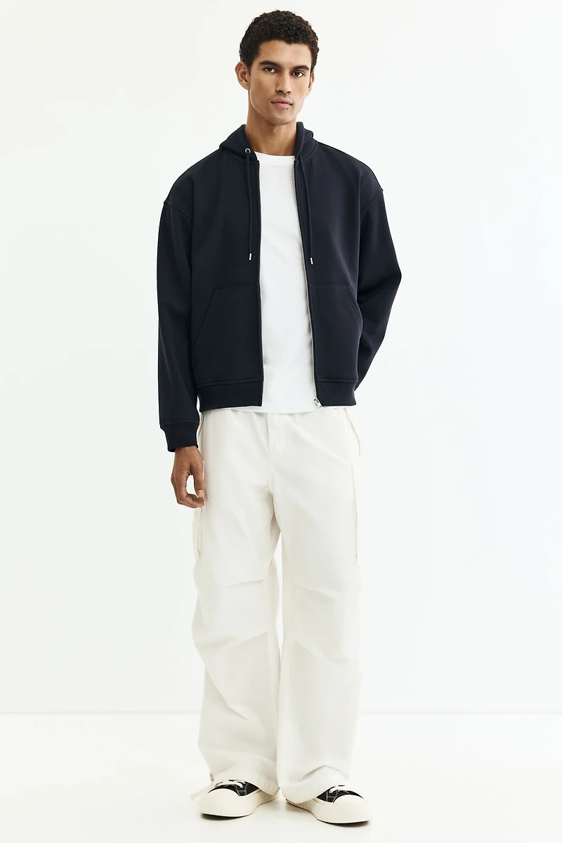 Veste à fermeture éclair ample capuche