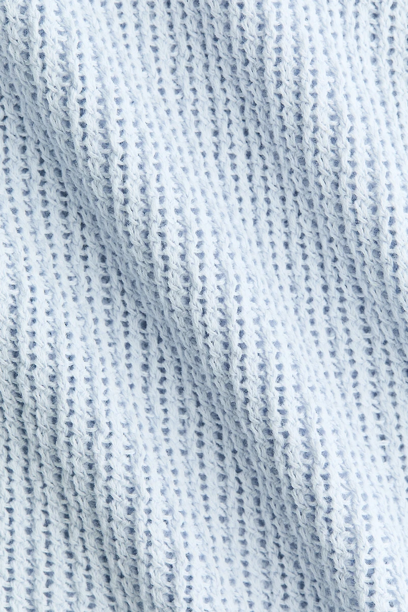Robe avec détail en tricot pointelle