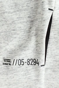 Veste à capuche et fermeture éclair