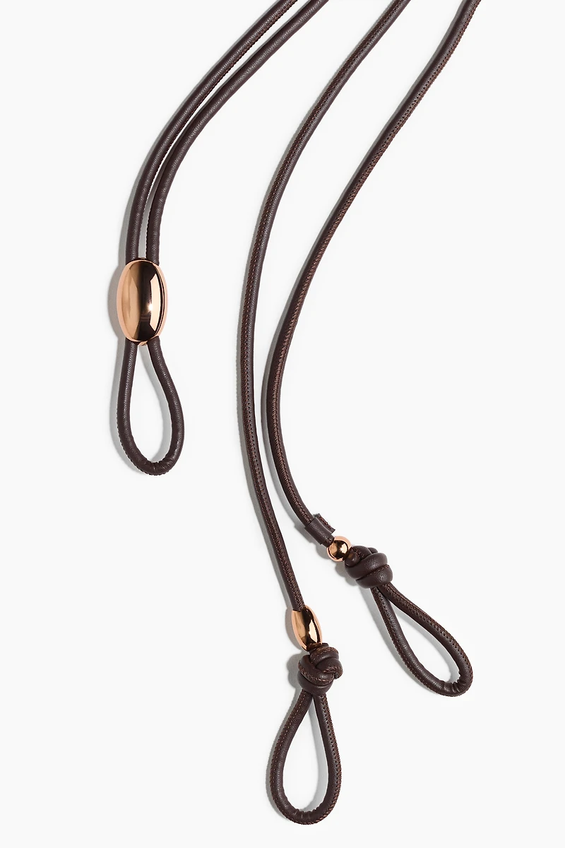 Ceinture en tissu enduit