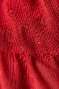 Jupe smockée à volants