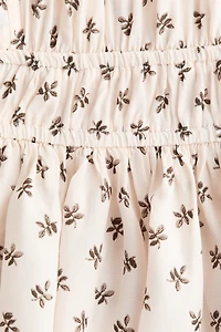 Blouse à manches volantées avec basque